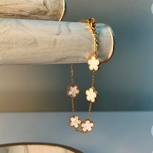 Elegant Gold and White Floral Bracelet